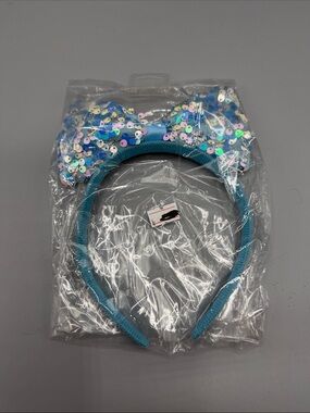 New powder, blue headband for little girl with sparkles on the bow